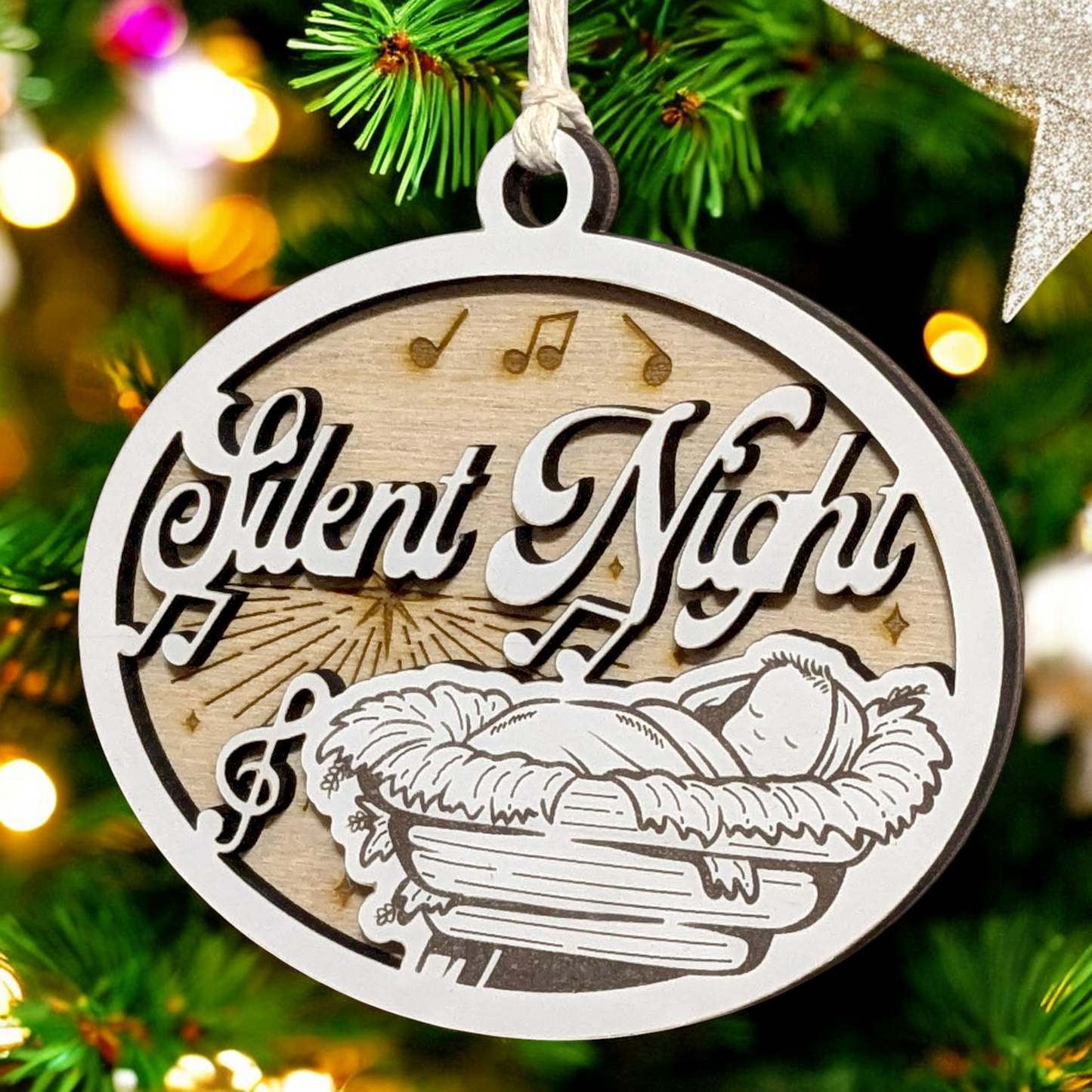 "Silent Night" 3.5"-5" Oval Laser Cut Wooden Christmas Ornament, Handcrafted in USA, Manger Scene with Baby Jesus & Music Notes, Whiteboard & Natural Wood Layers