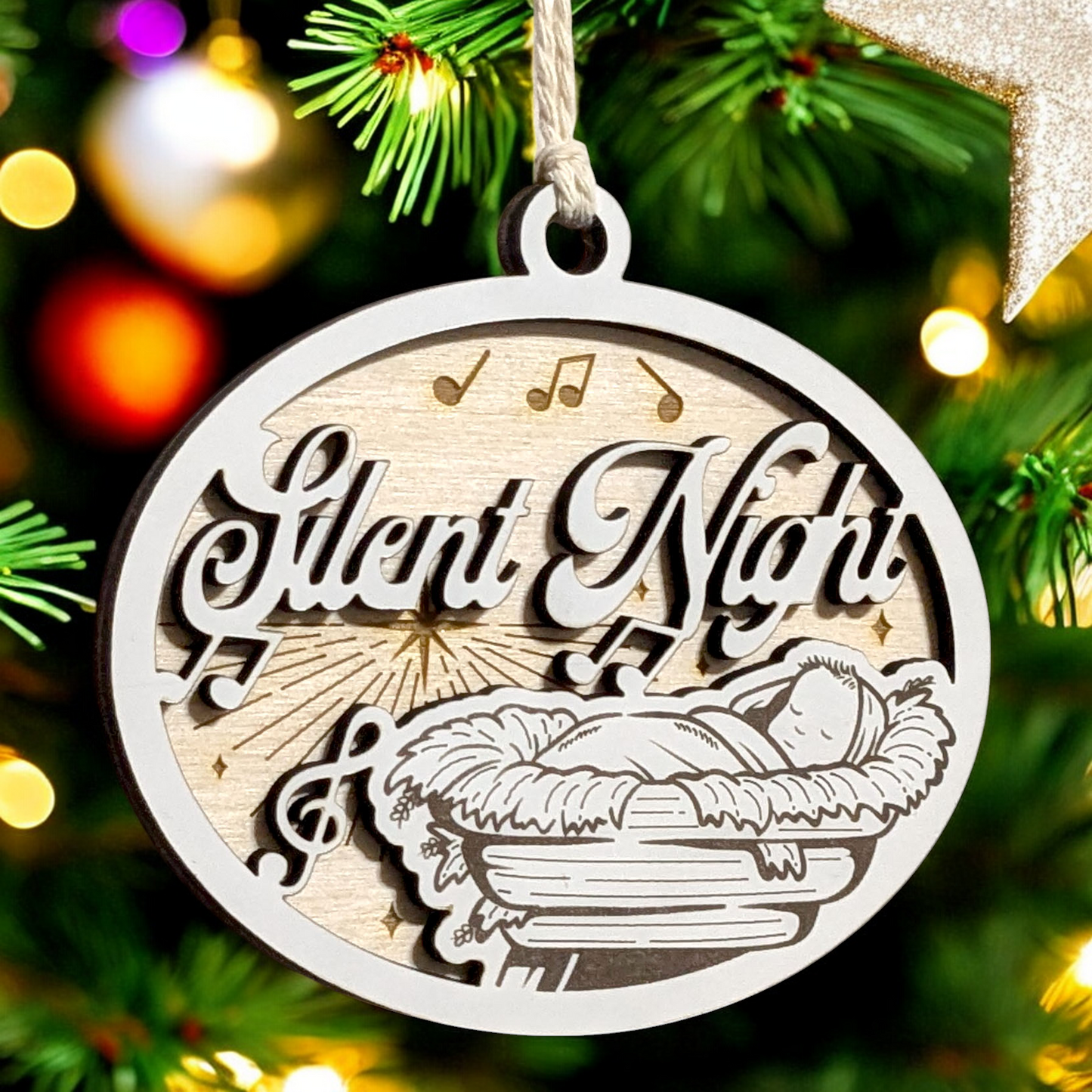 "Silent Night" 3.5"-5" Oval Laser Cut Wooden Christmas Ornament, Handcrafted in USA, Manger Scene with Baby Jesus & Music Notes, Whiteboard & Natural Wood Layers