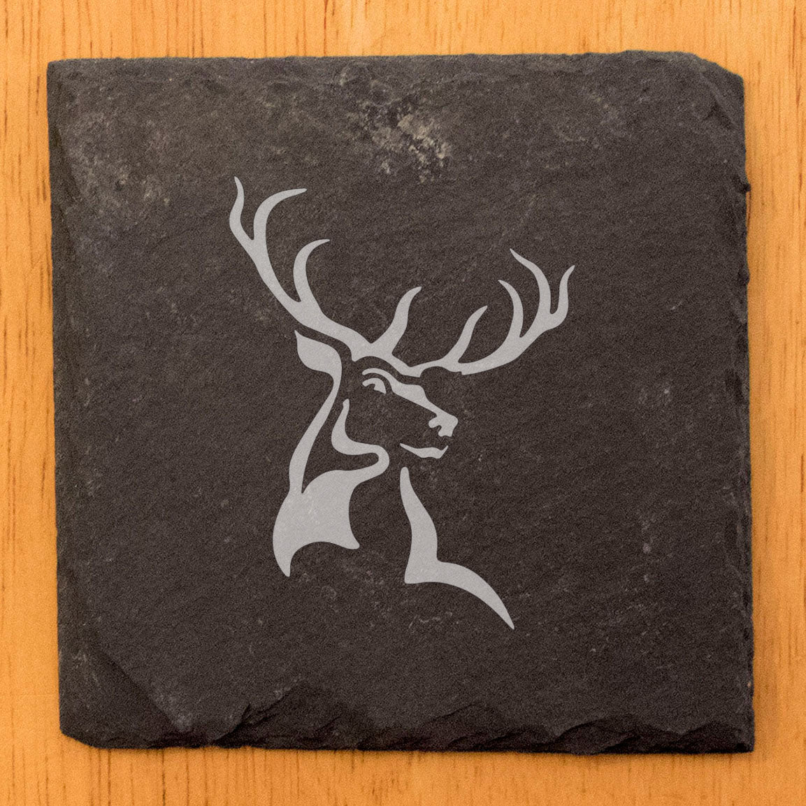 Nature's Masterpiece: Gray Slate Coasters Featuring a Powerful Buck Deer Design