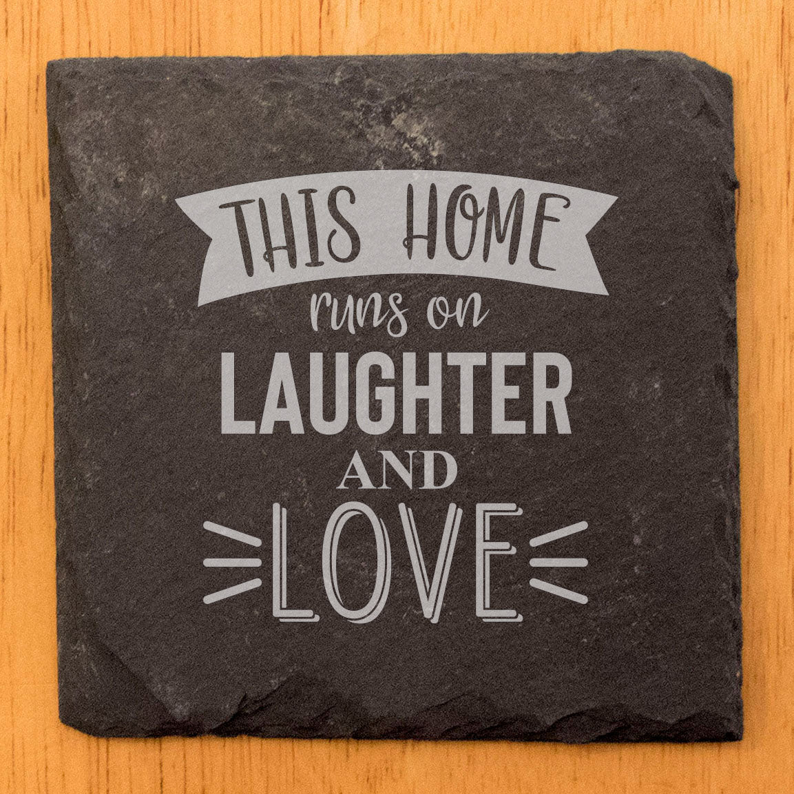 Hilarious Home Decor: "This Home Runs on Laughter & Love" Coasters
