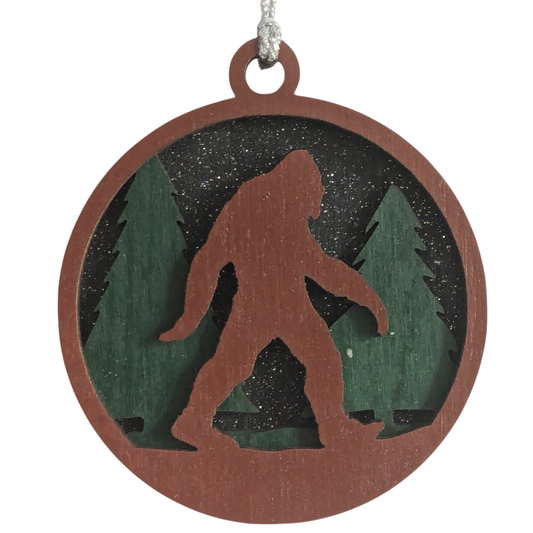 3-Layer Wooden Bigfoot Ornament - 3" Round Christmas Tree Decoration - Laser Cut Sasquatch Forest Scene - Oregon Handcrafted