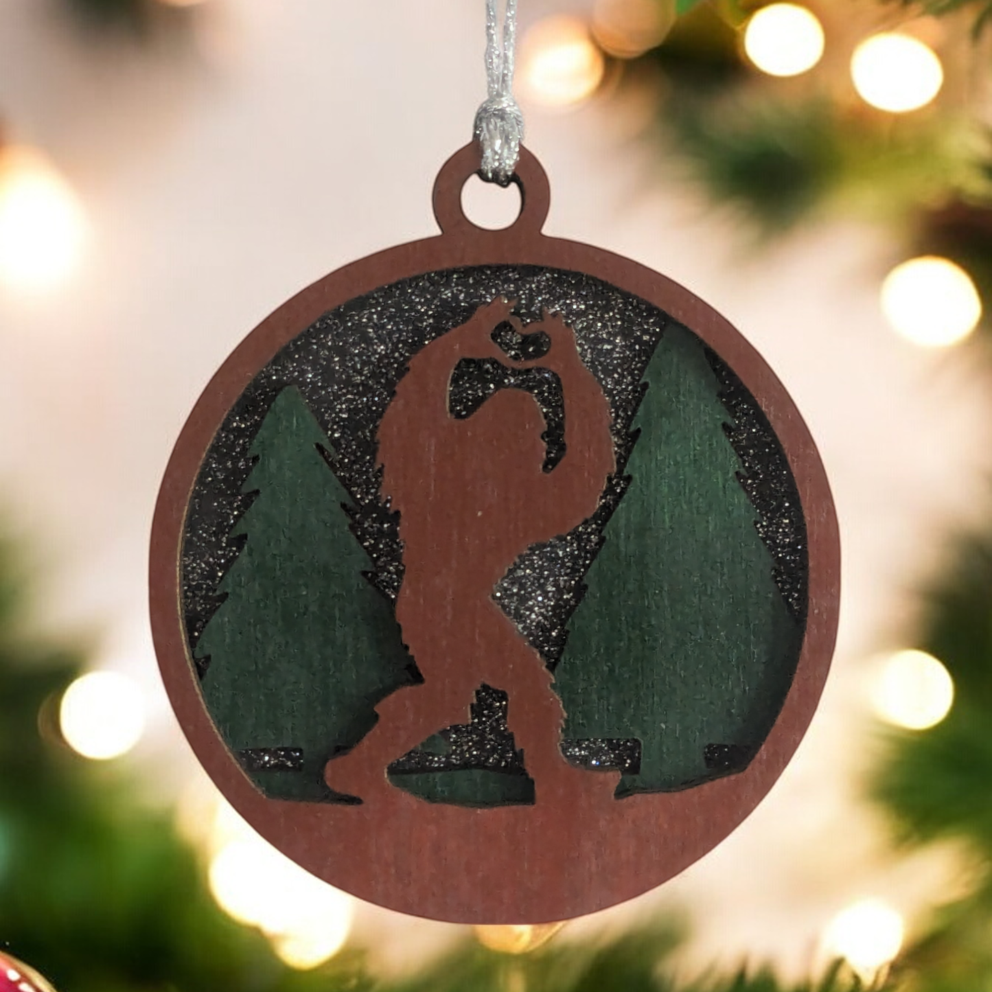 Bigfoot Heart Hands 3D Wood Christmas Ornament - Handcrafted Sasquatch Forest Scene, 3" Round Laser Cut