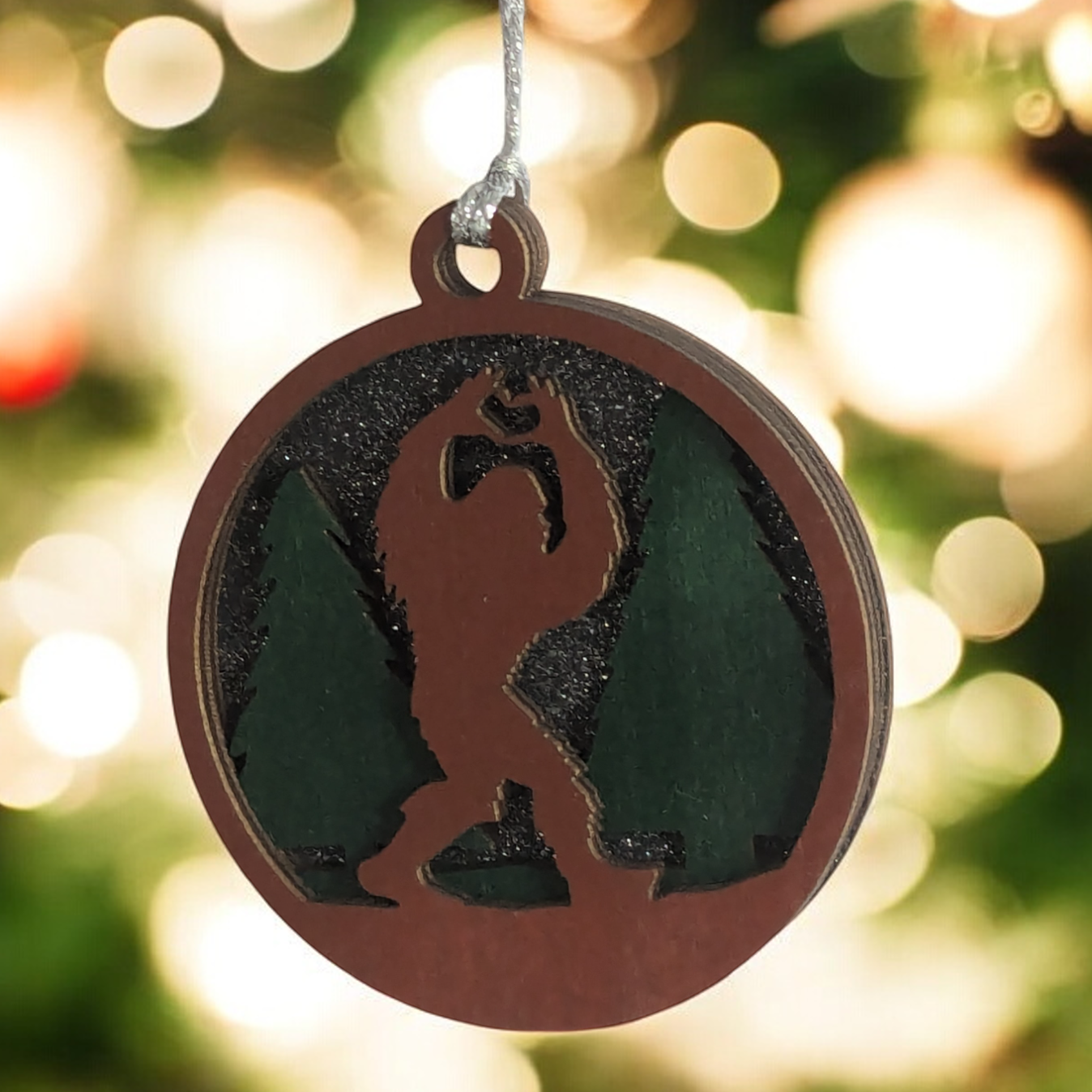 Bigfoot Heart Hands 3D Wood Christmas Ornament - Handcrafted Sasquatch Forest Scene, 3" Round Laser Cut