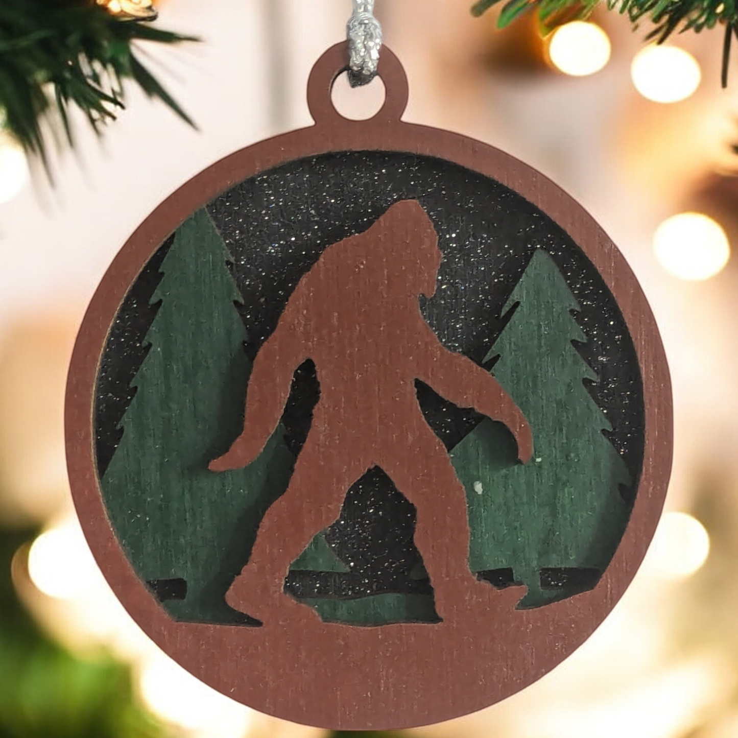 3-Layer Wooden Bigfoot Ornament - 3" Round Christmas Tree Decoration - Laser Cut Sasquatch Forest Scene - Oregon Handcrafted