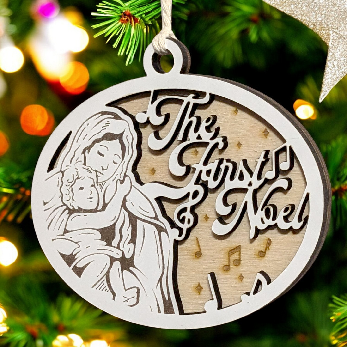 "The First Noel" 3.5"-5" Oval Laser Cut Wooden Christmas Ornament, Handcrafted in USA, Whiteboard & Natural Wood Layers, Mary & Baby Jesus Scene with Music Notes