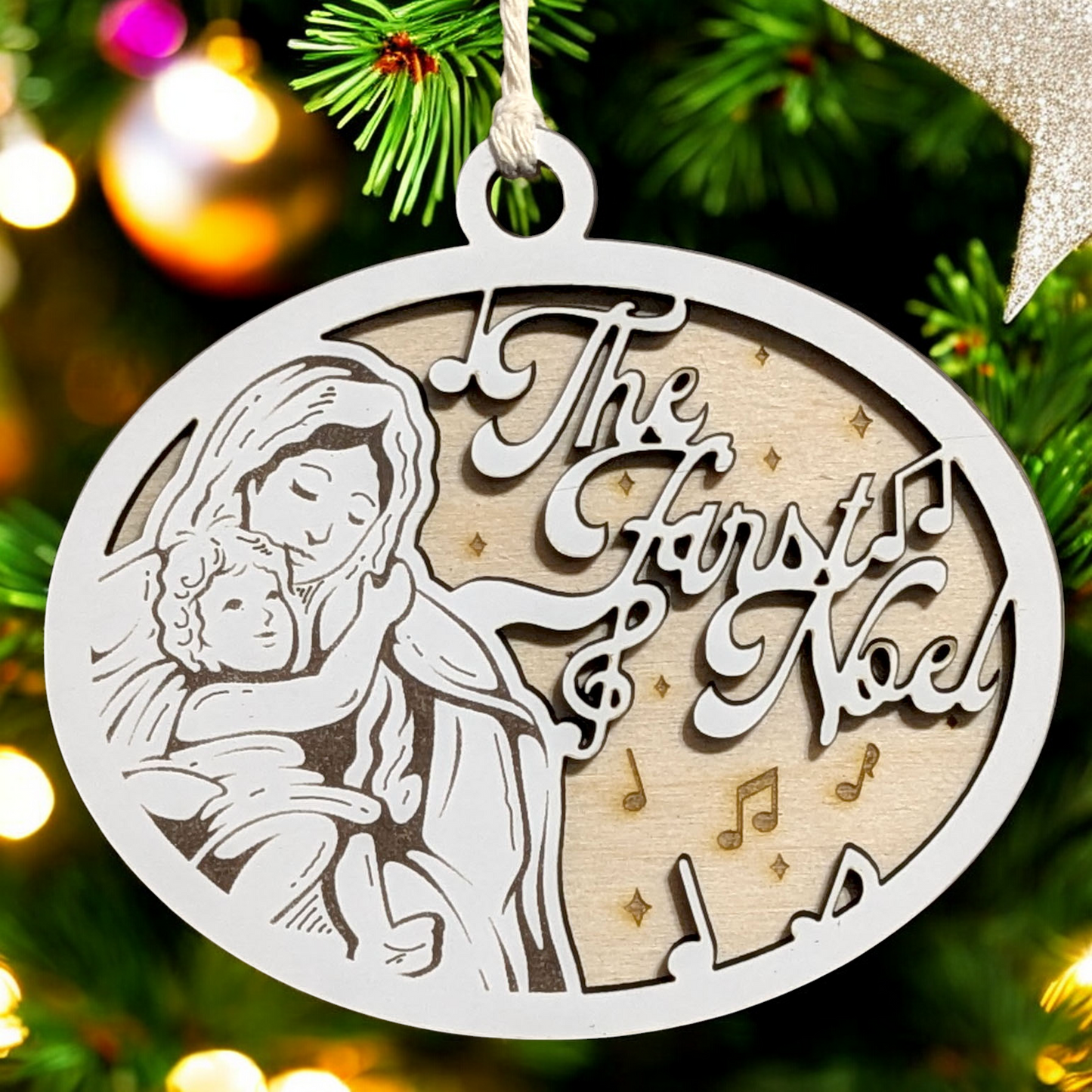 "The First Noel" 3.5"-5" Oval Laser Cut Wooden Christmas Ornament, Handcrafted in USA, Whiteboard & Natural Wood Layers, Mary & Baby Jesus Scene with Music Notes