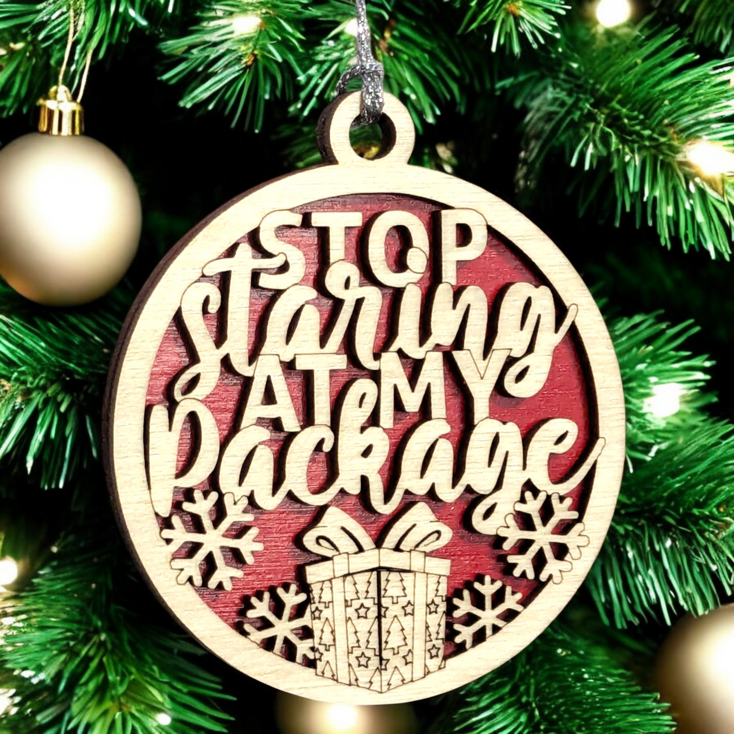 3" Round Two Layer Laser Cut Wood Ornament - Funny Sarcastic Holiday Decor with 'Stop Staring At My Package' Innuendo Phrase, Handmade in USA, Perfect for Xmas Tree or Gift Exchange Gag Present