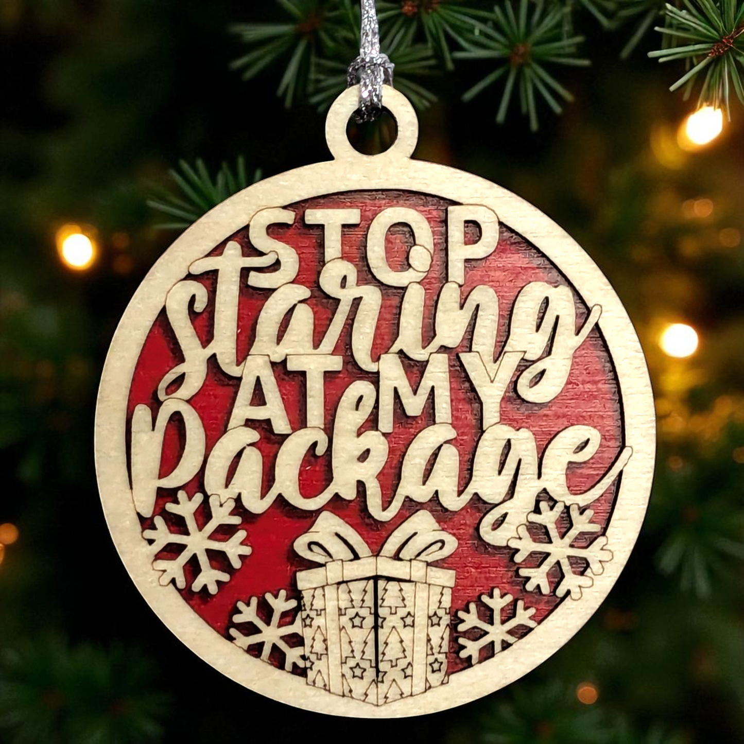 3" Round Two Layer Laser Cut Wood Ornament - Funny Sarcastic Holiday Decor with 'Stop Staring At My Package' Innuendo Phrase, Handmade in USA, Perfect for Xmas Tree or Gift Exchange Gag Present